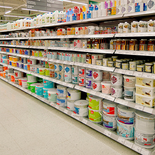 Store shelves of interior and exterior paints for sale.